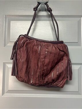 LUCKY PENNY  crushed /pleated  eggplant colored drawstring shoulder bag.